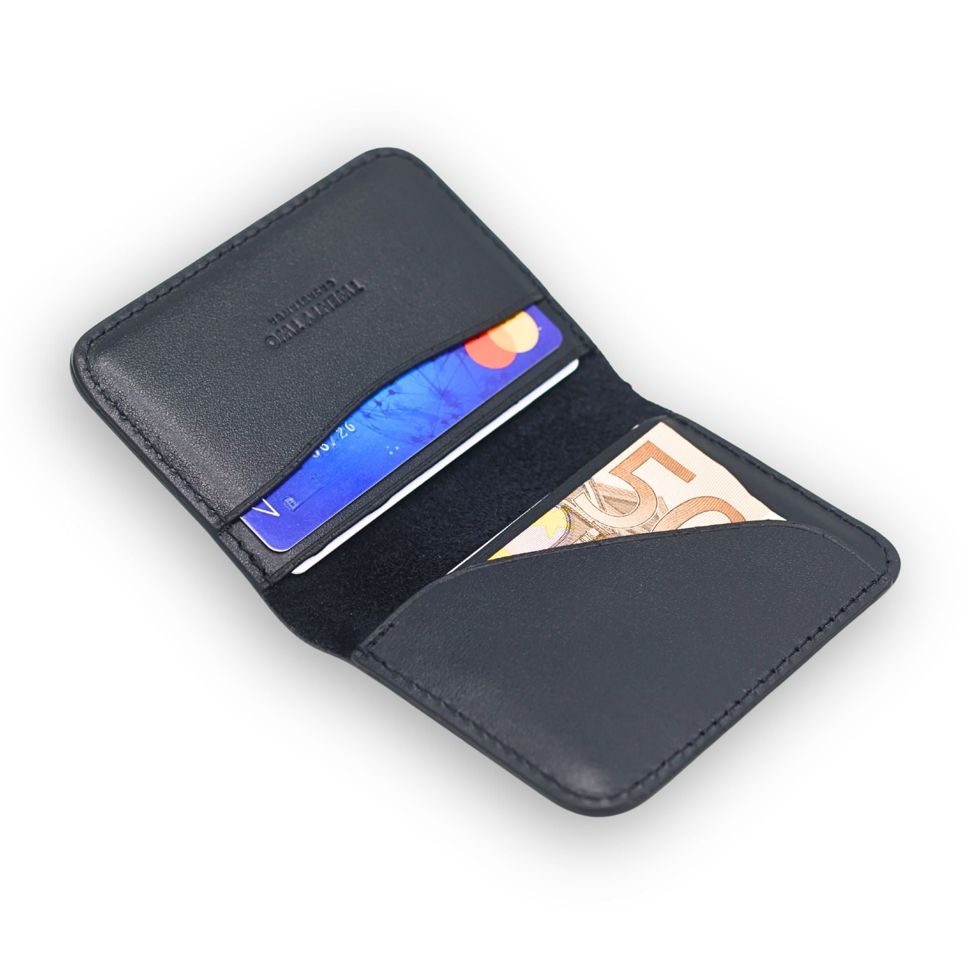 Black leather wallet with cards and money on a white background